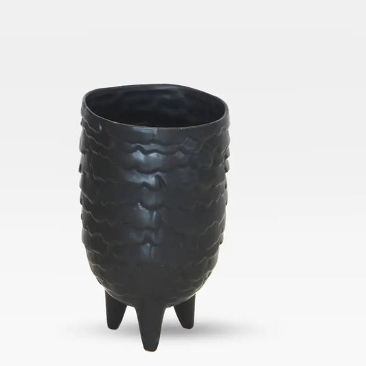 three footed ceramic vase